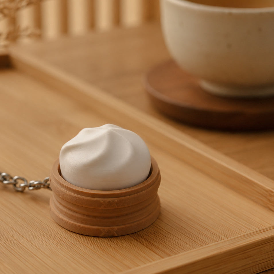 Kuma Labs Bao Bun Clicker — top view showing steamed bun shape
