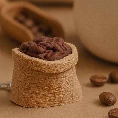 Coffee Sack Clicker pocket comfort object — cozy aesthetic flat lay