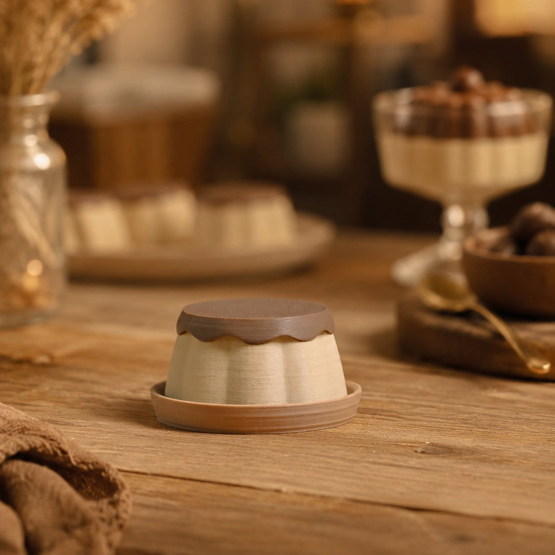 Kuma Labs Pudding Clicker — side view showing rounded pudding shape
