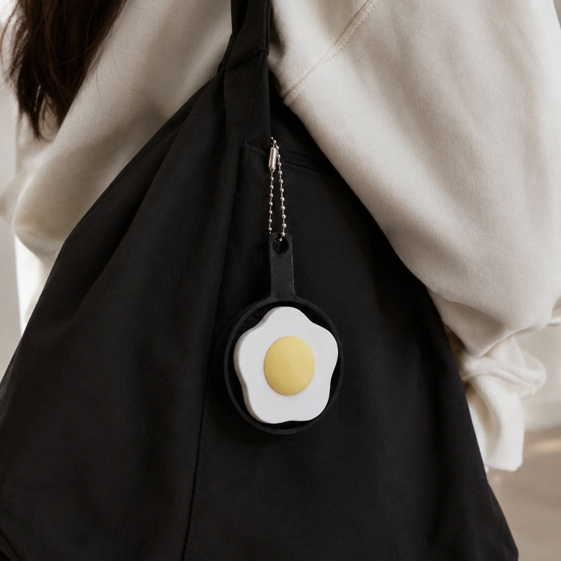 Kuma Labs Fried Egg Clicker — lifestyle photo on morning desk