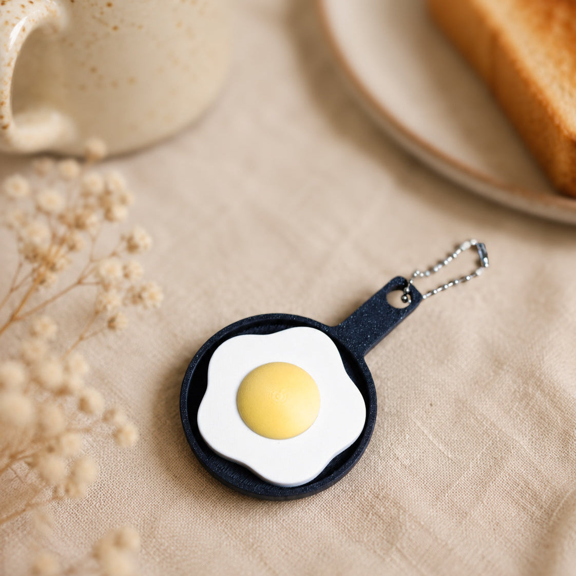 Kuma Labs Fried Egg Clicker — styled cozy photo