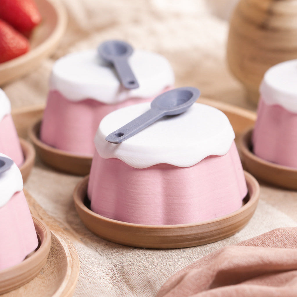 Strawberry Pudding Clicker pocket comfort object — cozy aesthetic flat lay