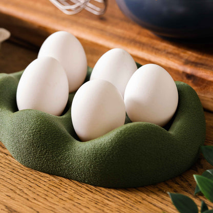 Morning Egg Nest by Kuma Labs — in use on a kitchen counter